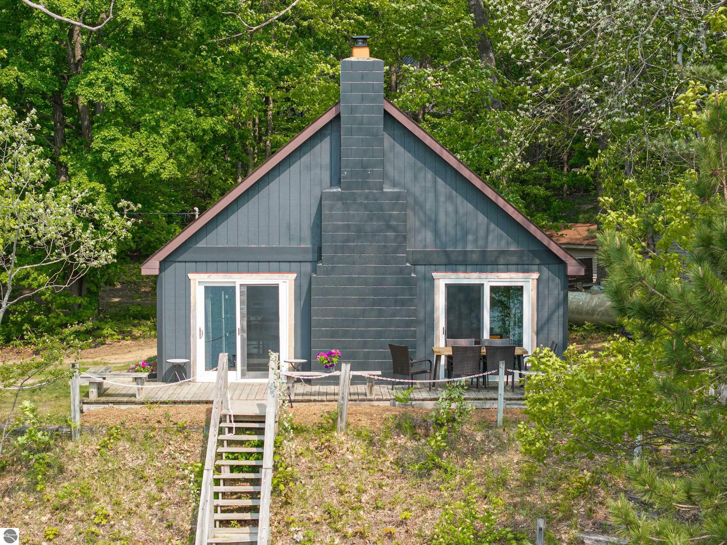 Property Photo:  10974 NE Bluff Drive  MI 49659 