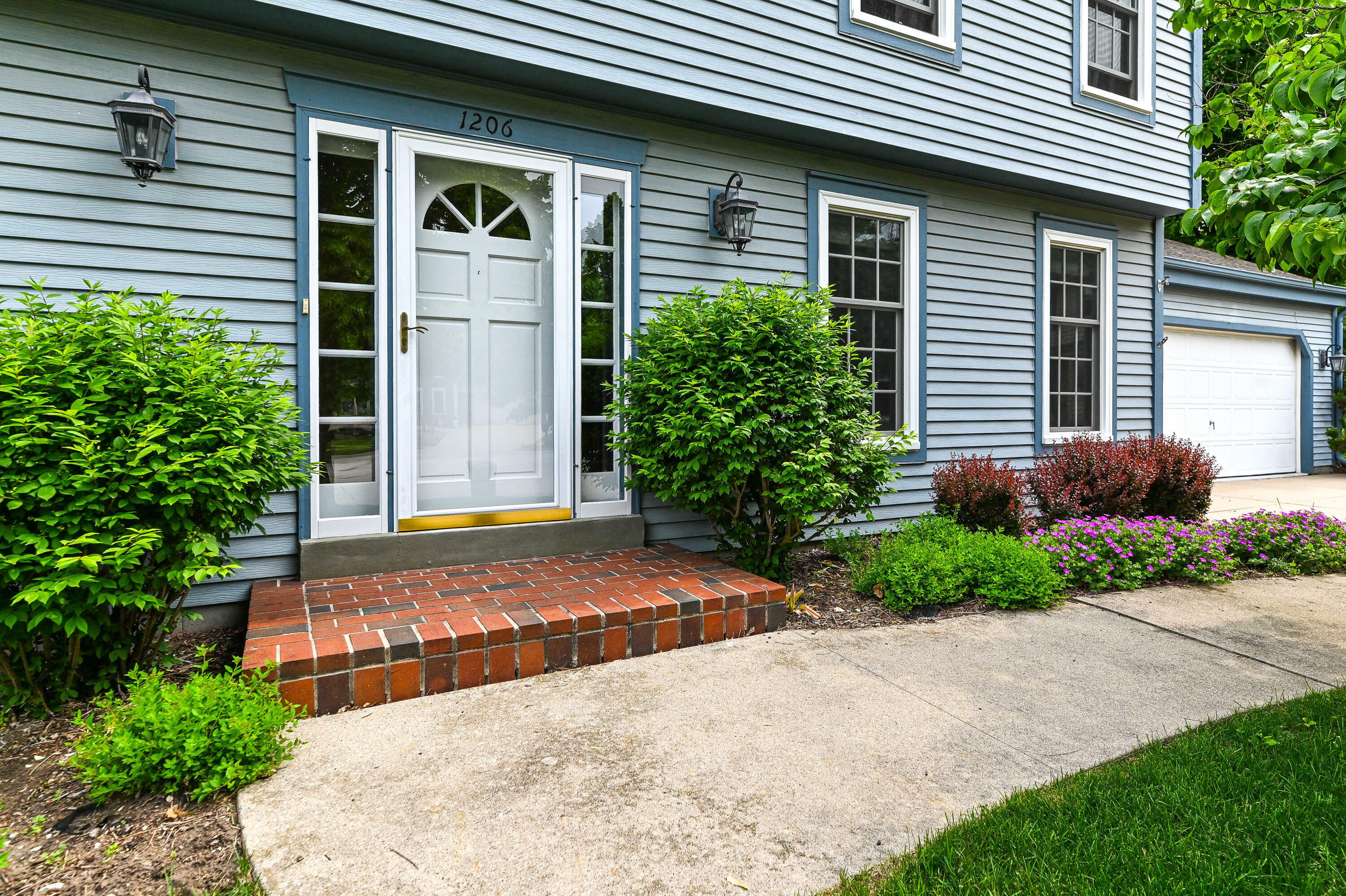 Property Photo: 1206 Woodview Dr WI 53189
