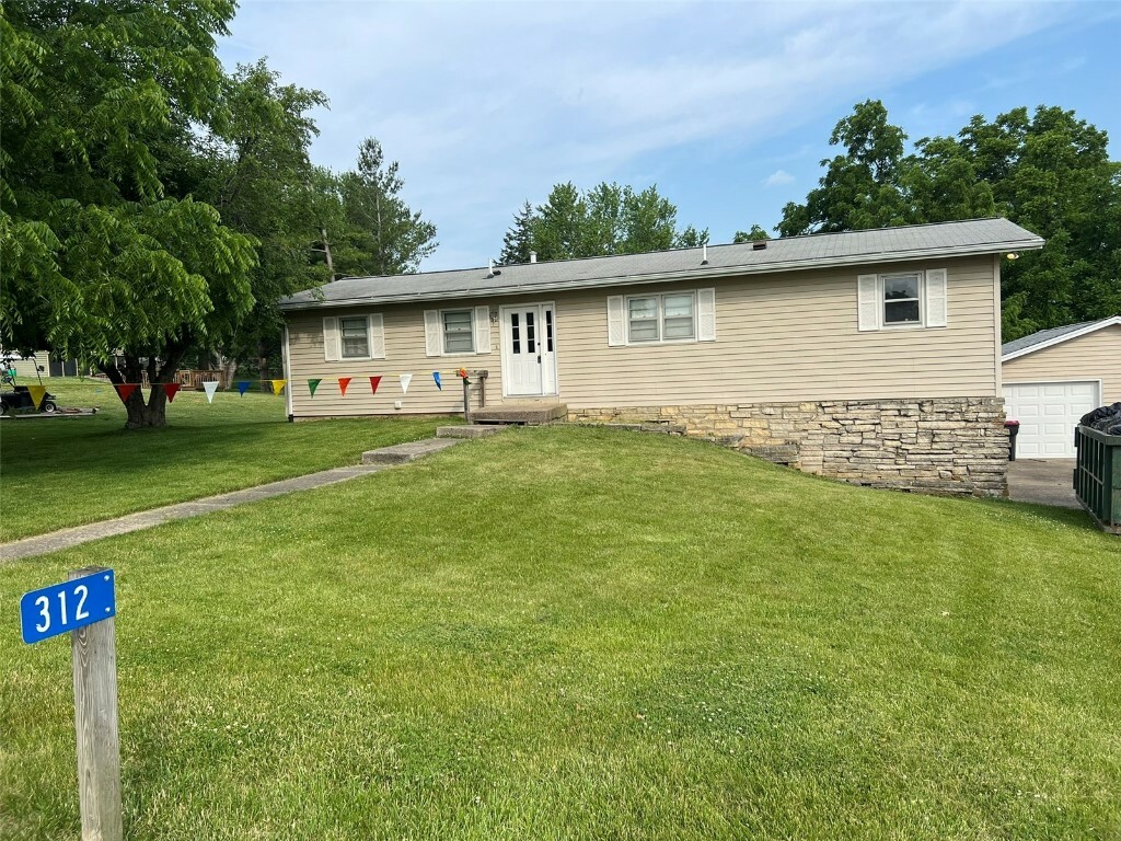 Property Photo: 312 Lake View Drive NE IA 52333