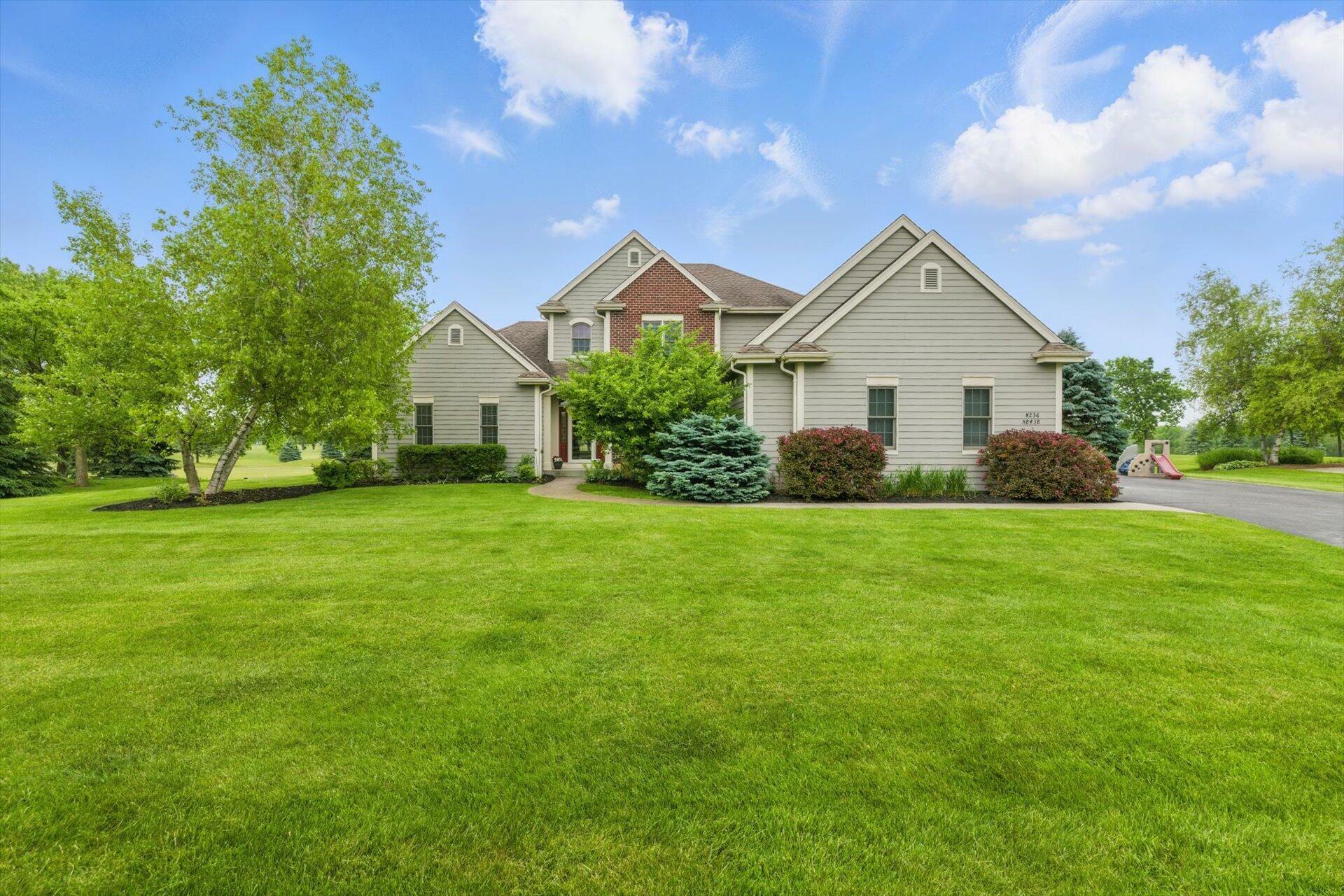 Property Photo: W236n8438 Clubhouse Cir WI 53089