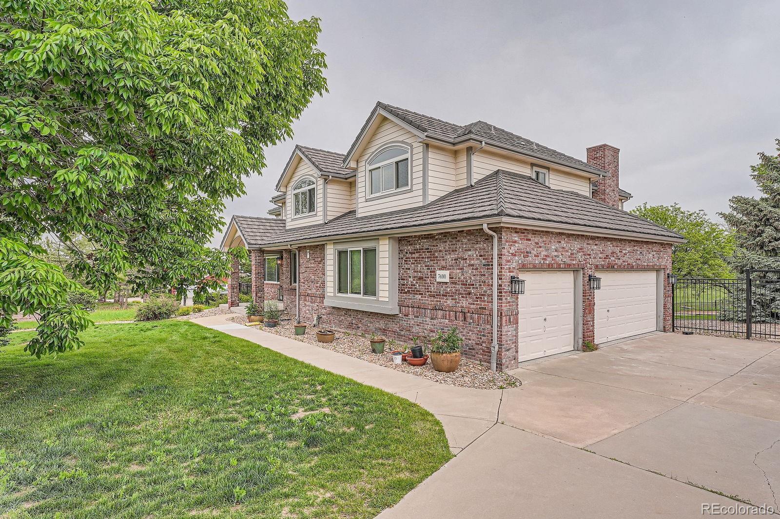 Property Photo: 7400 S Genoa Circle CO 80016