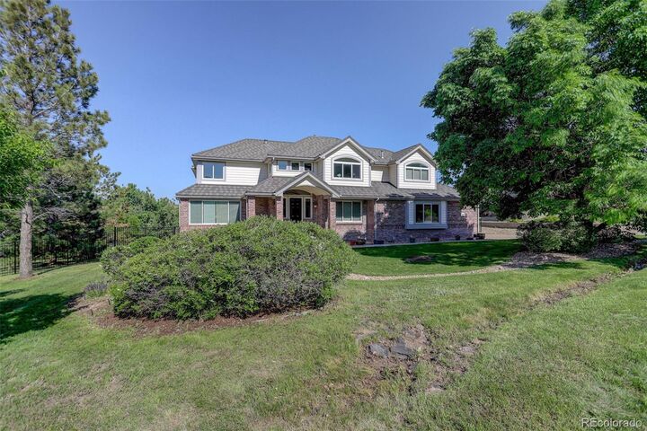 Property Photo:  7400 S Genoa Circle  CO 80016