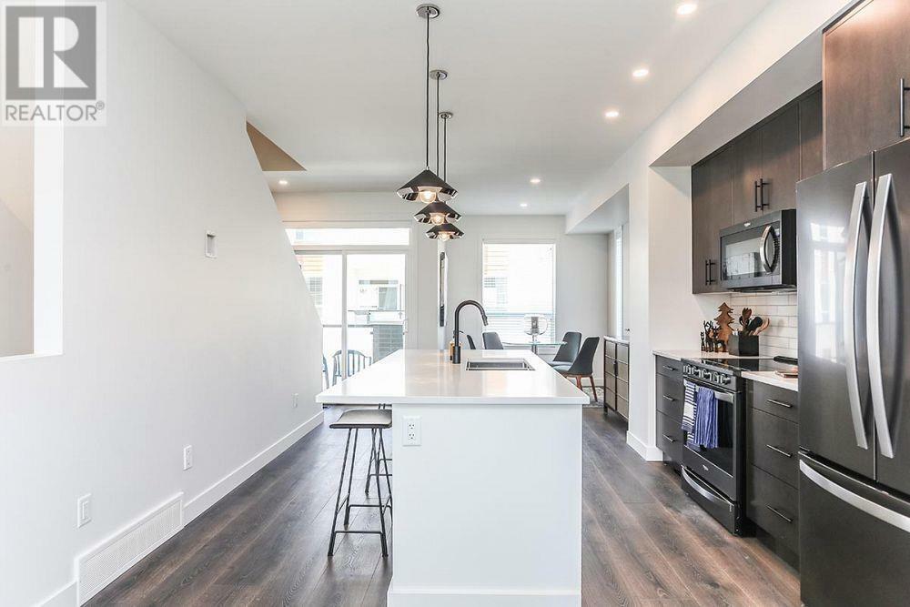 Property Photo: 610 Academy Way 363 BC V1V 0E8