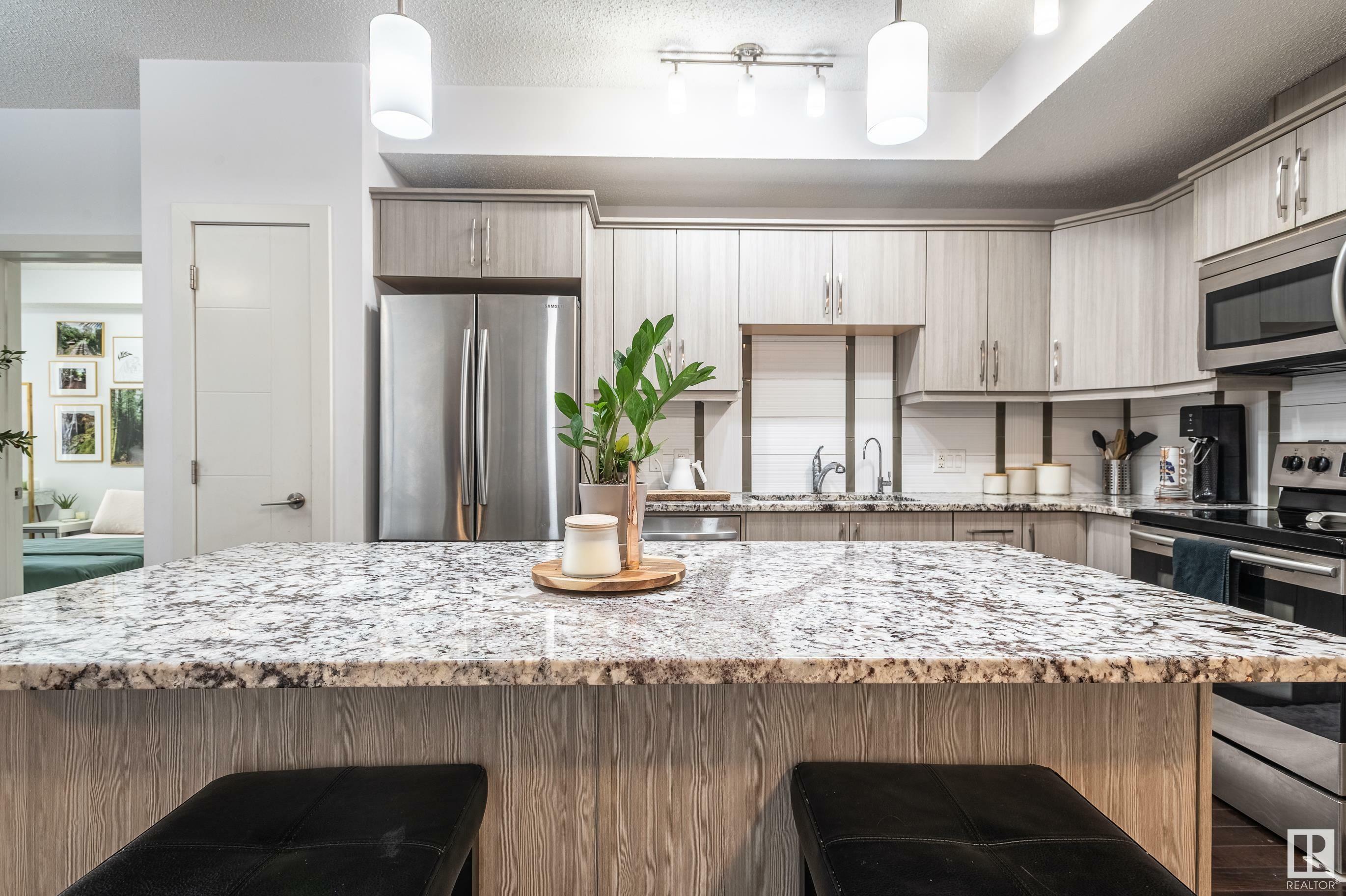 Property Photo: 10523 123 Street NW 305 AB T5N 1N9
