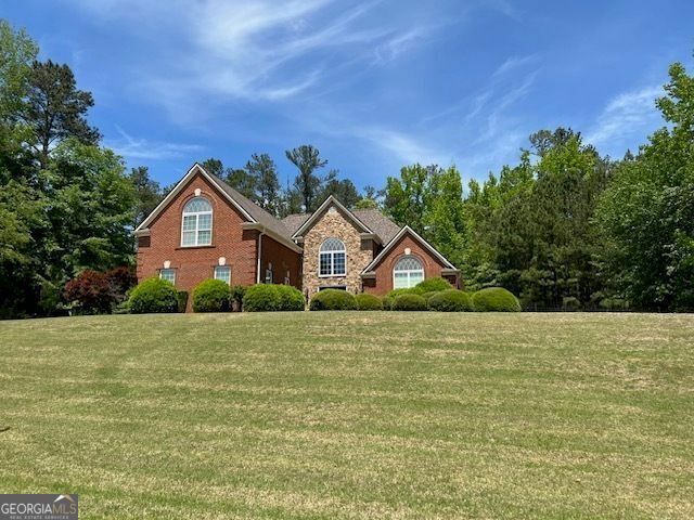 Property Photo: 1209 Persimmon Way GA 30252