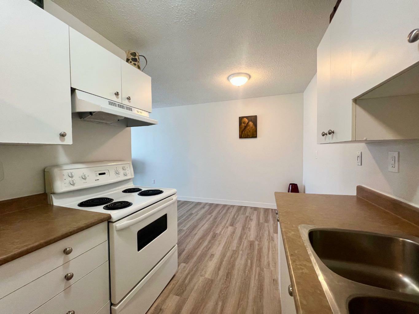 Property Photo: 4904 54 Street 304 AB T4N 2G8