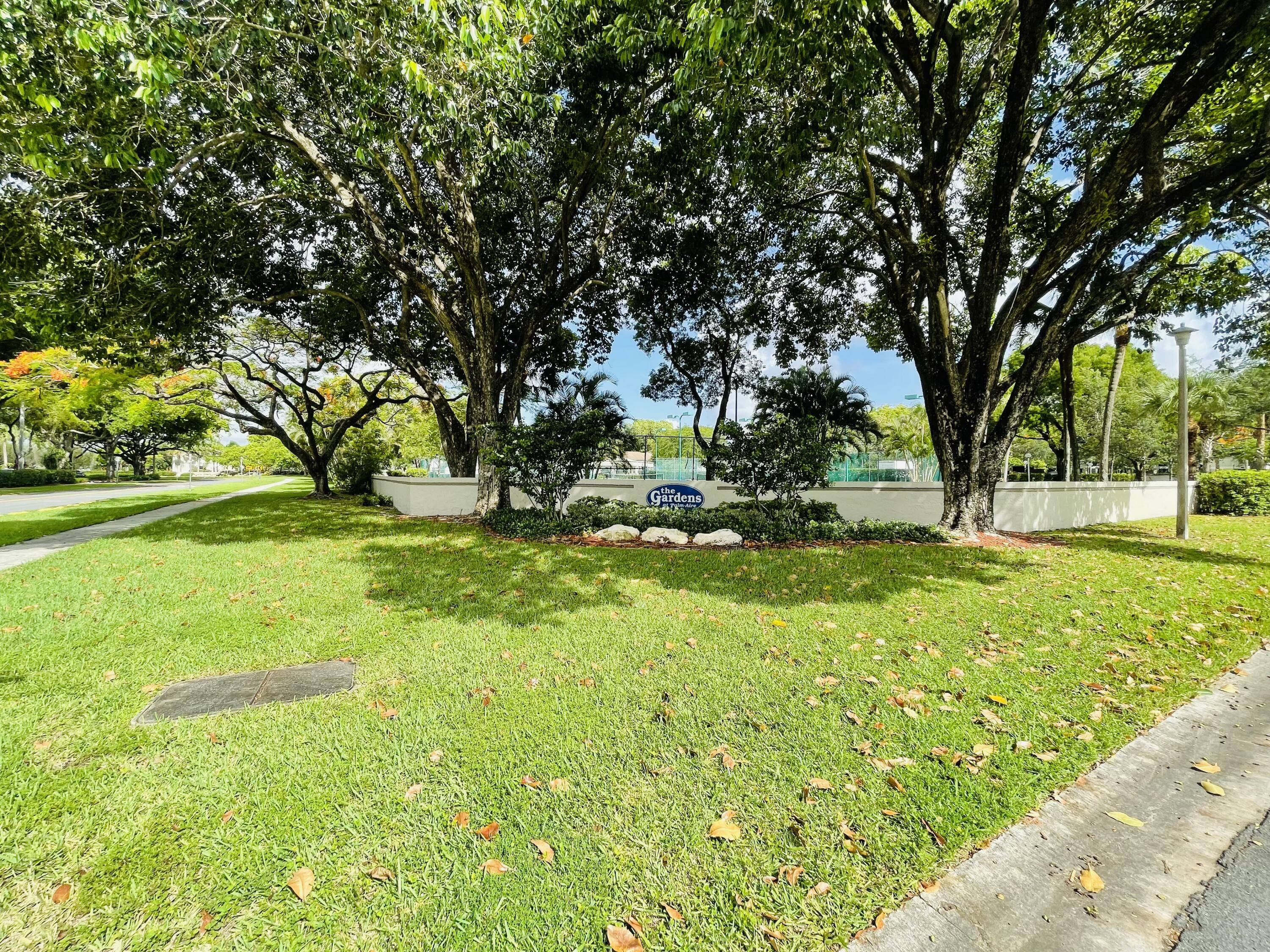 Property Photo: 717 Gardens Drive 106 FL 33069