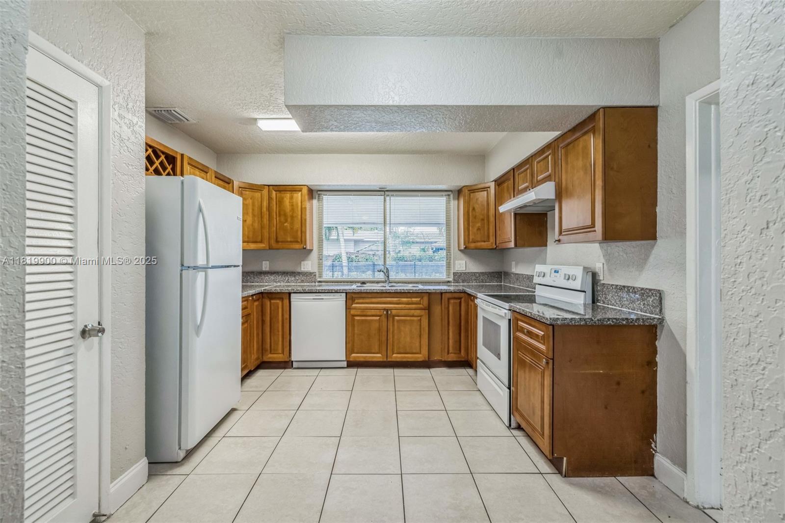 Property Photo:  4818 NW 8th St  FL 33317 