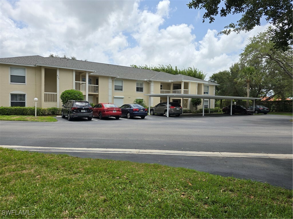 Property Photo: 605 Squire Circle 203 FL 34104