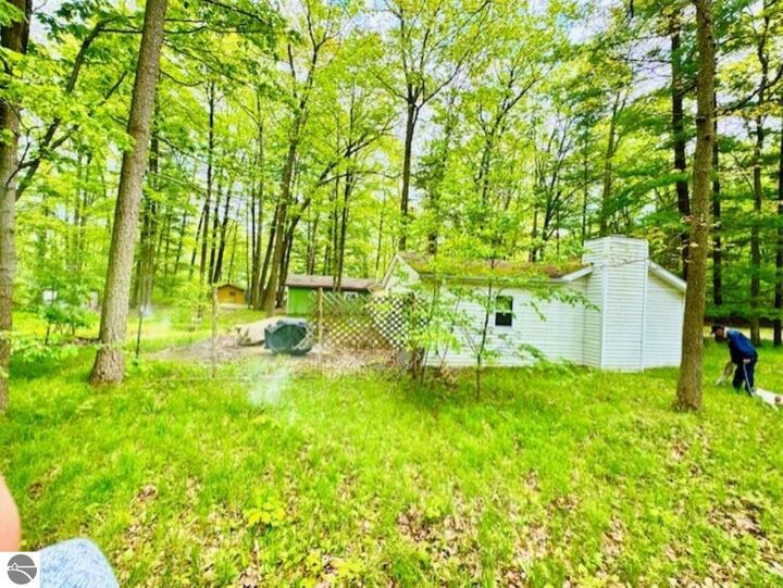 Property Photo:  751 Bungo Lake Road  MI 48625 