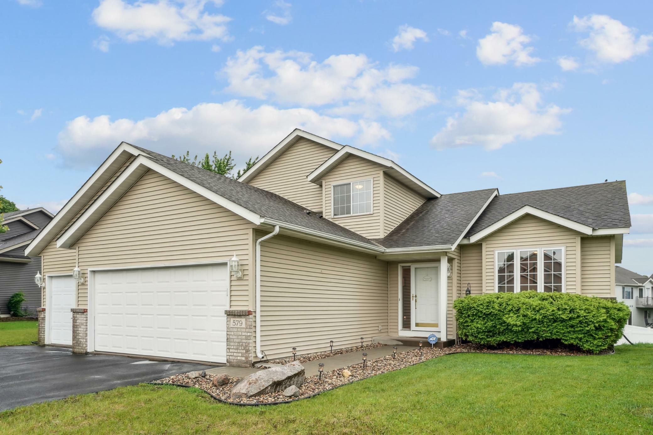 Property Photo: 579 Maple Knoll Circle NW MN 55376