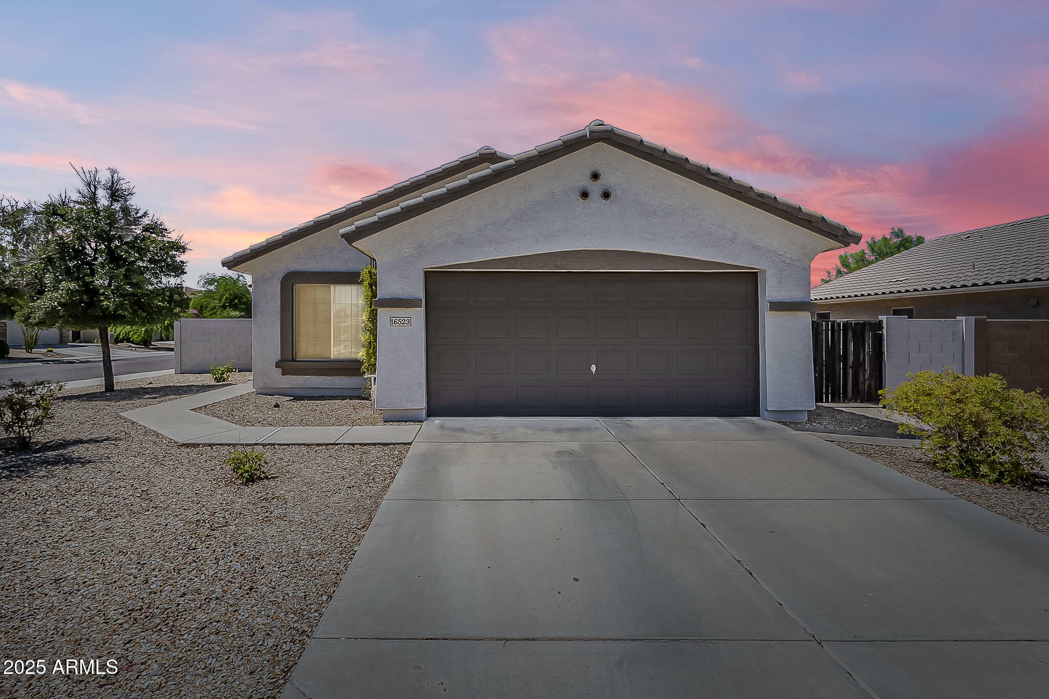 Property Photo: 16523 W Desert Bloom Street AZ 85338