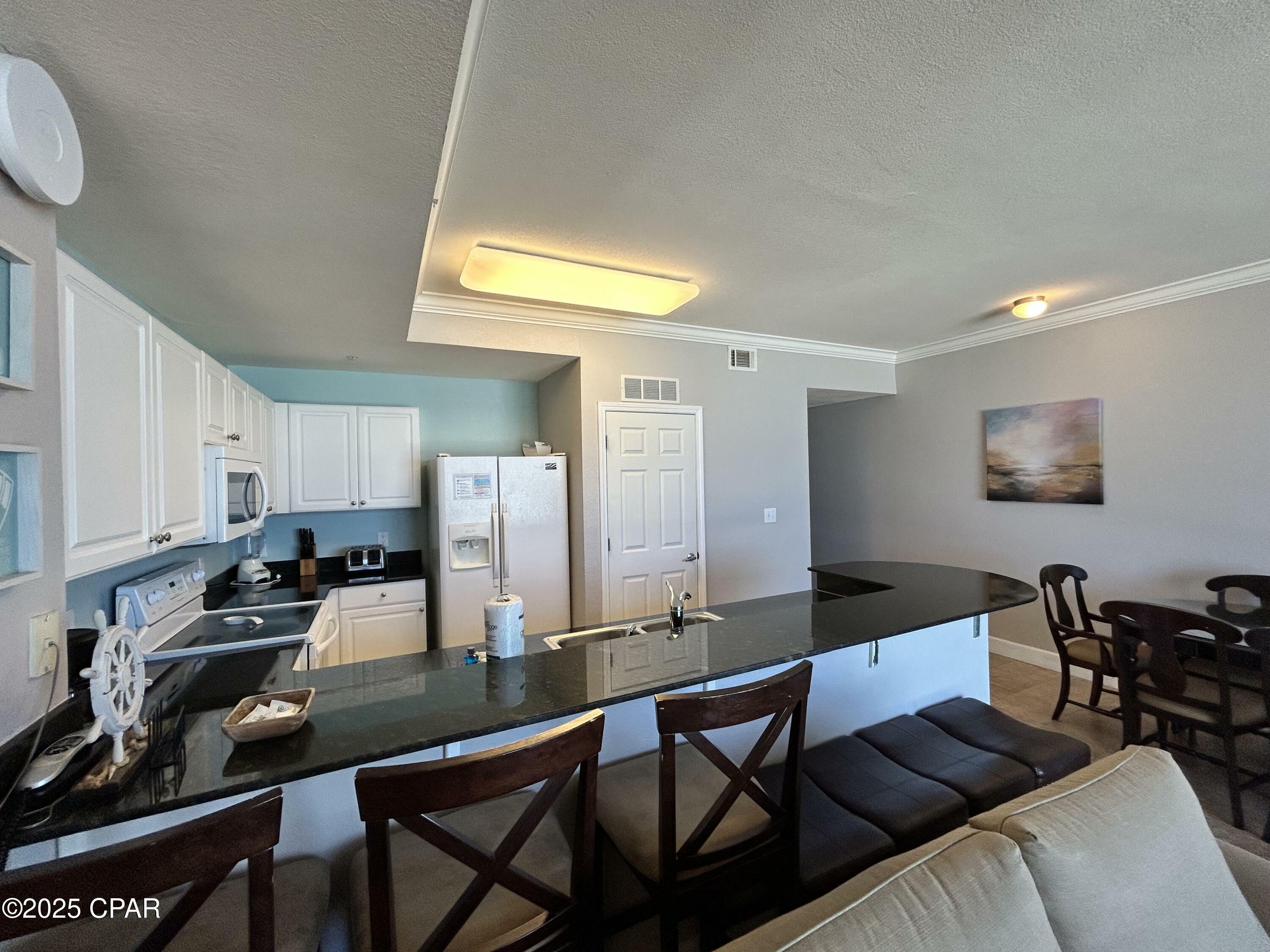 Property Photo: 16819 Front Beach Road 107 FL 32413