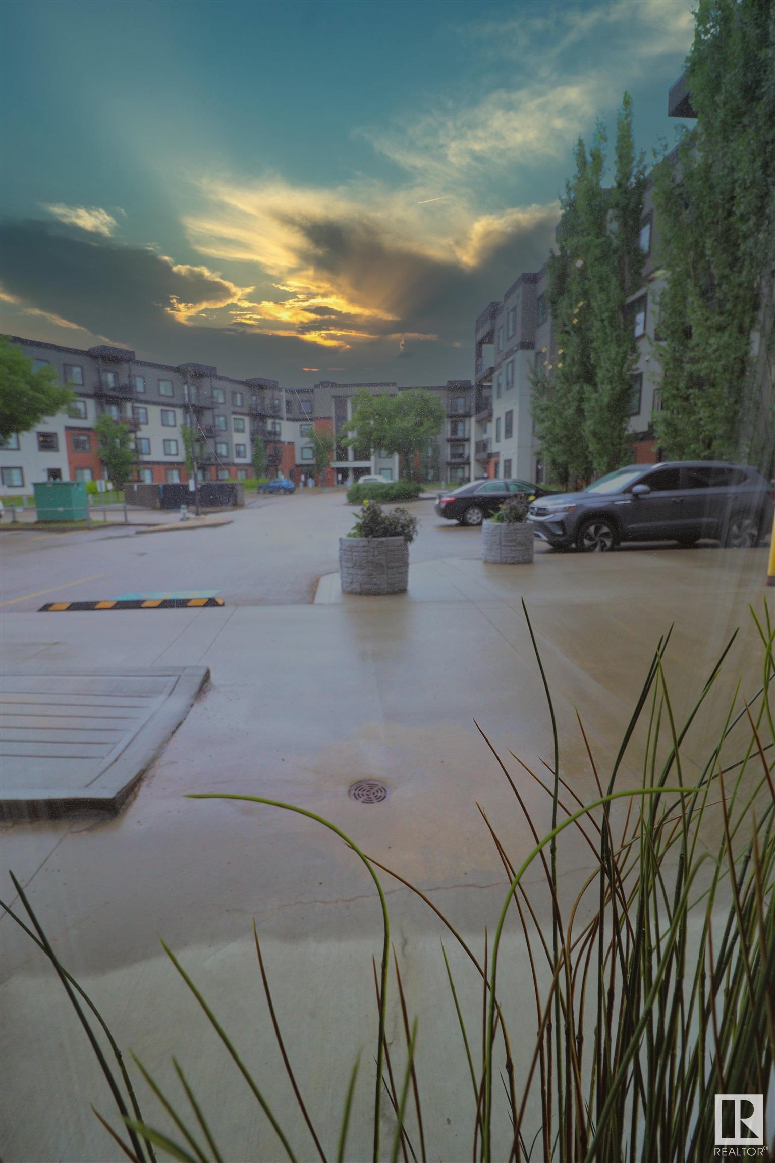 Property Photo: 1144 Adamson Drive SW 110 AB T6W 2X7
