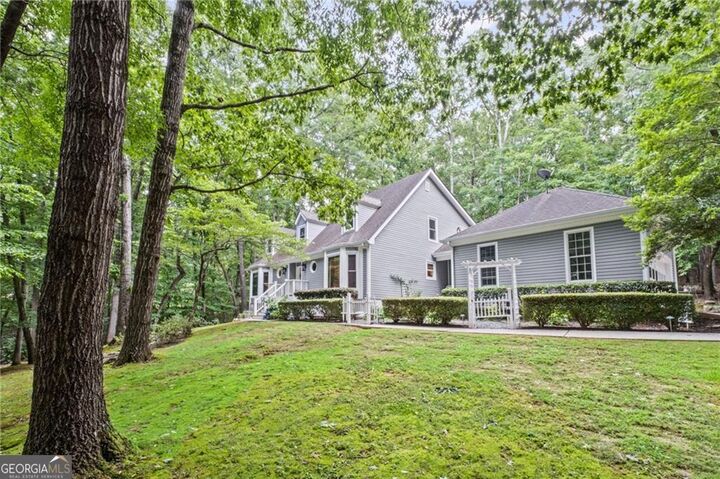 Property Photo:  115 Leaf Lake Drive  GA 30024 