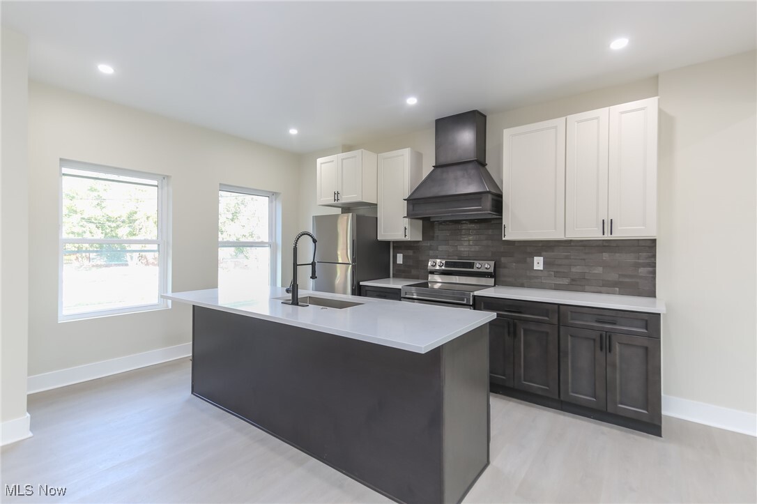 Property Photo: 1653 E 118th Street OH 44106