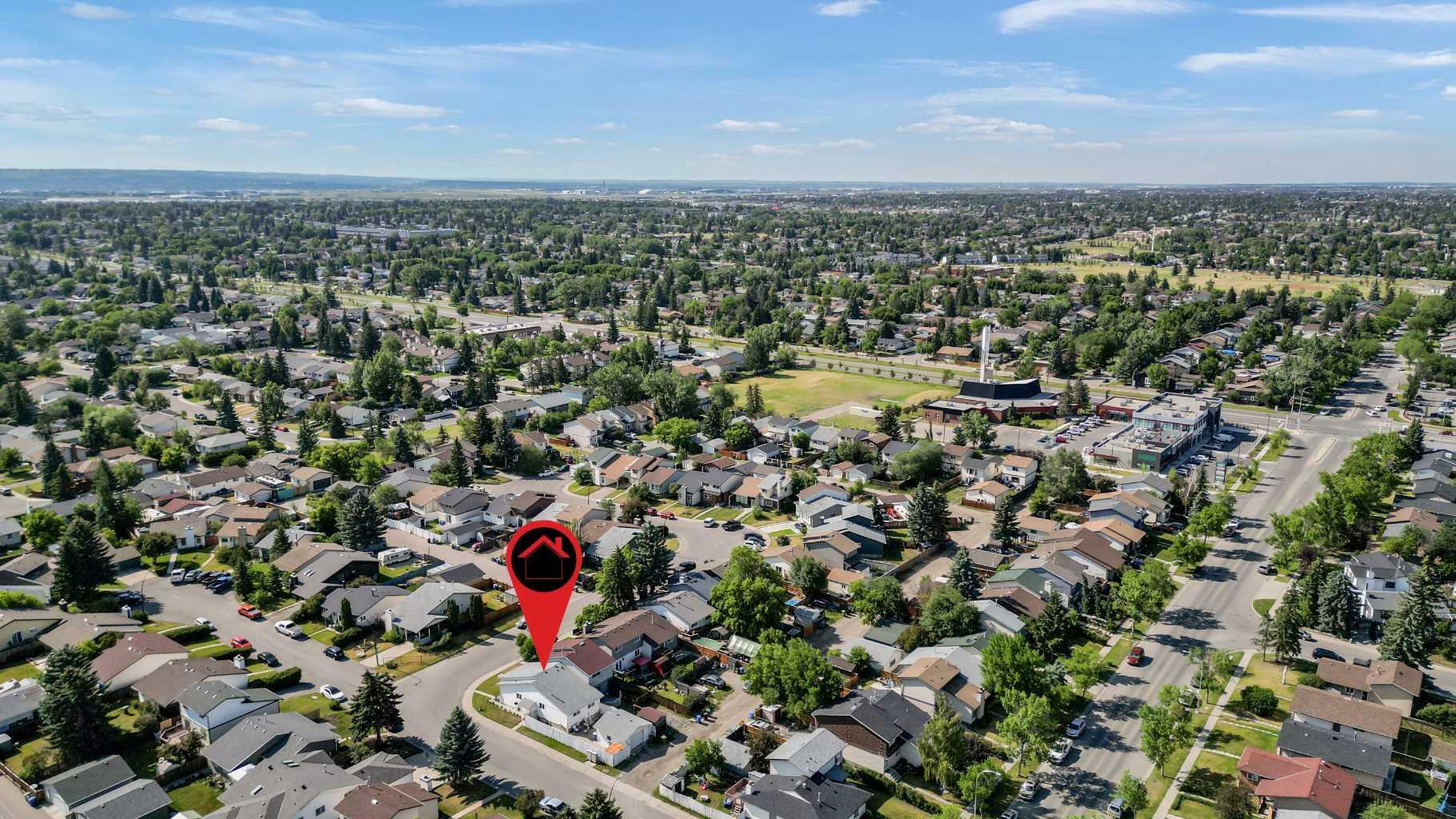 Property Photo: 130 Pinemeadow Road NE AB T1Y 4N9