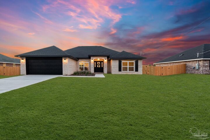 Property Photo: 7921 Twin Lake Dr FL 32583