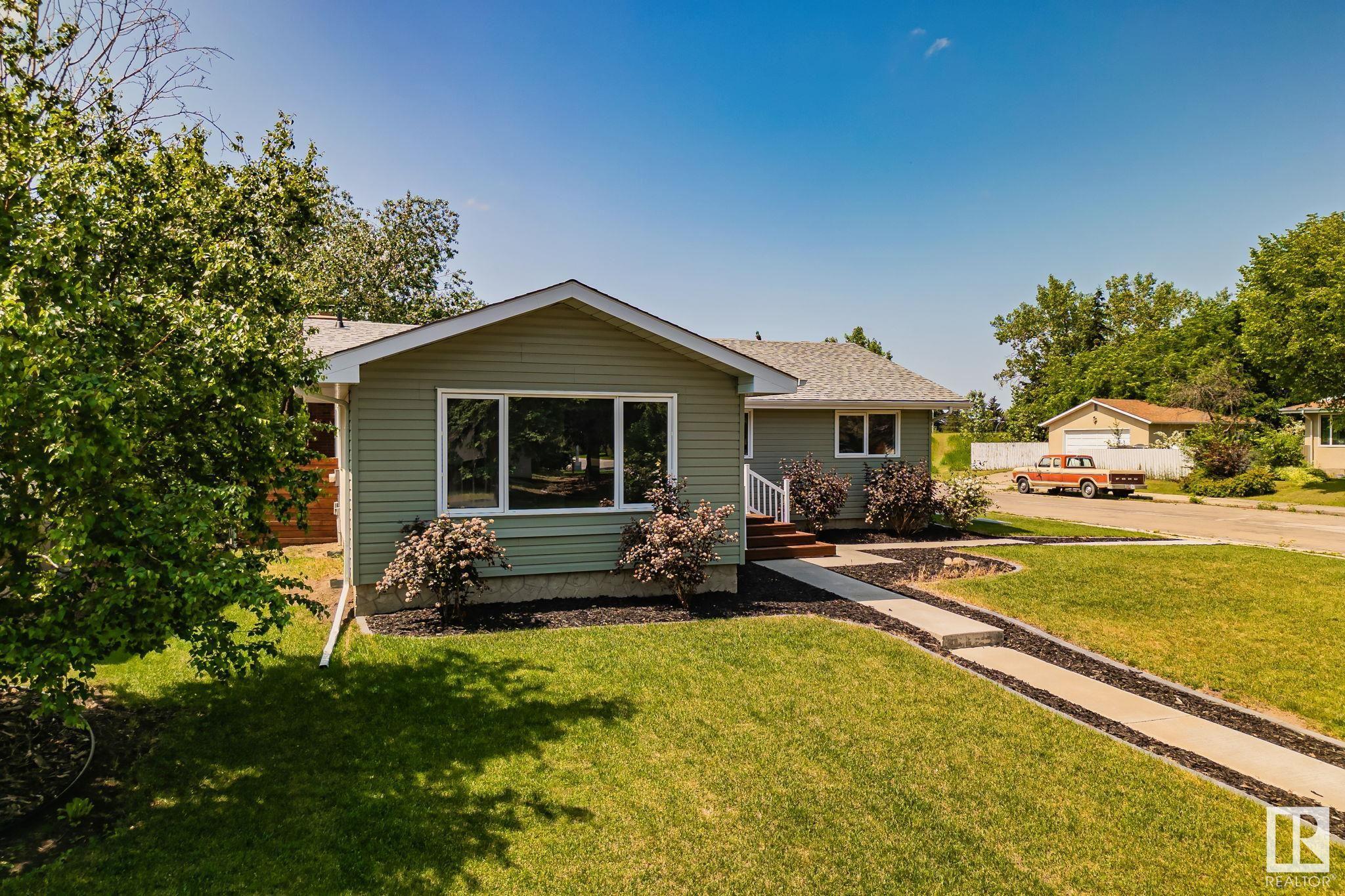 Property Photo: 4916 144 Street NW AB T6H 4G8