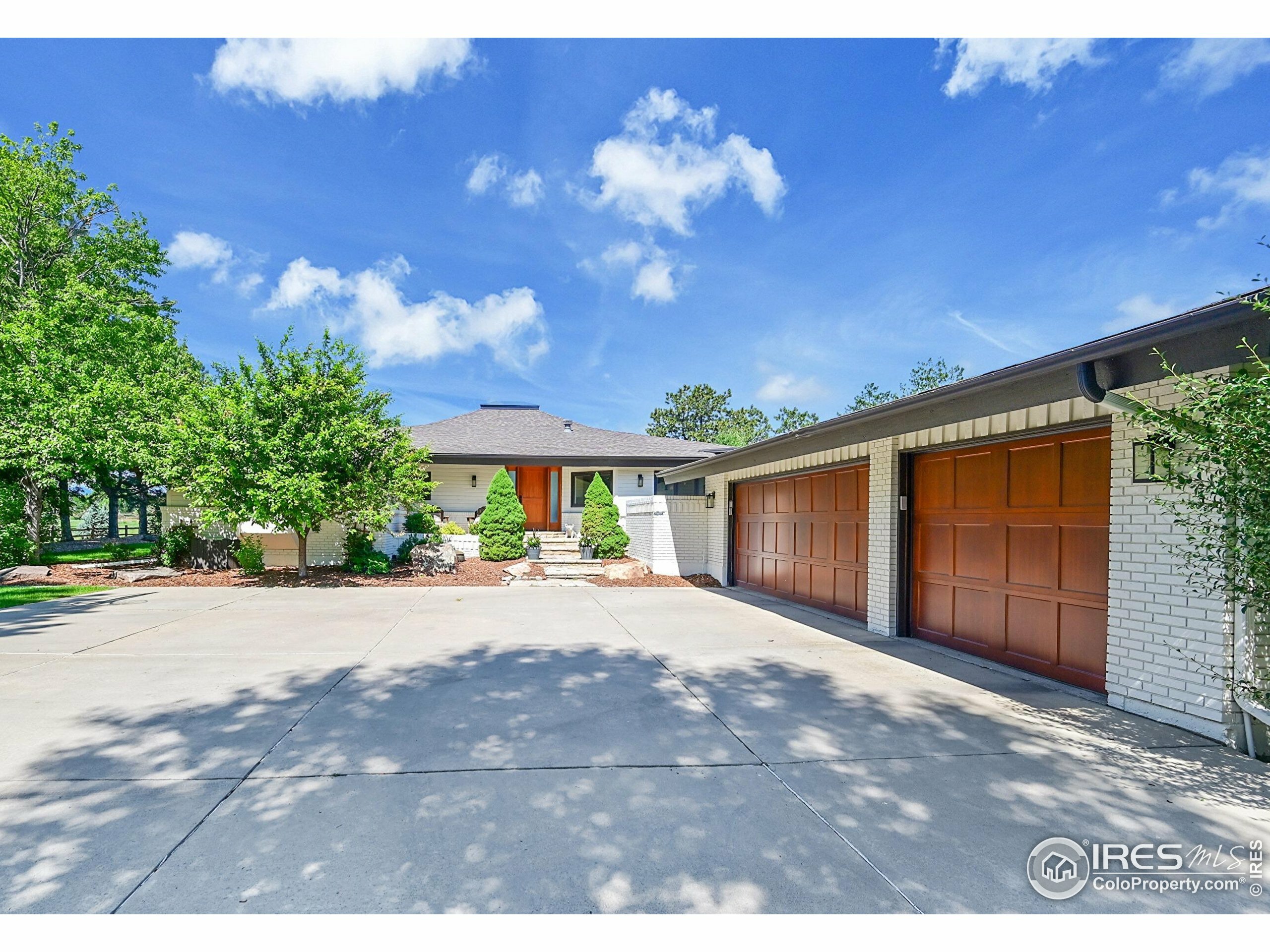 Property Photo: 8753 Crimson Clover Ln CO 80503