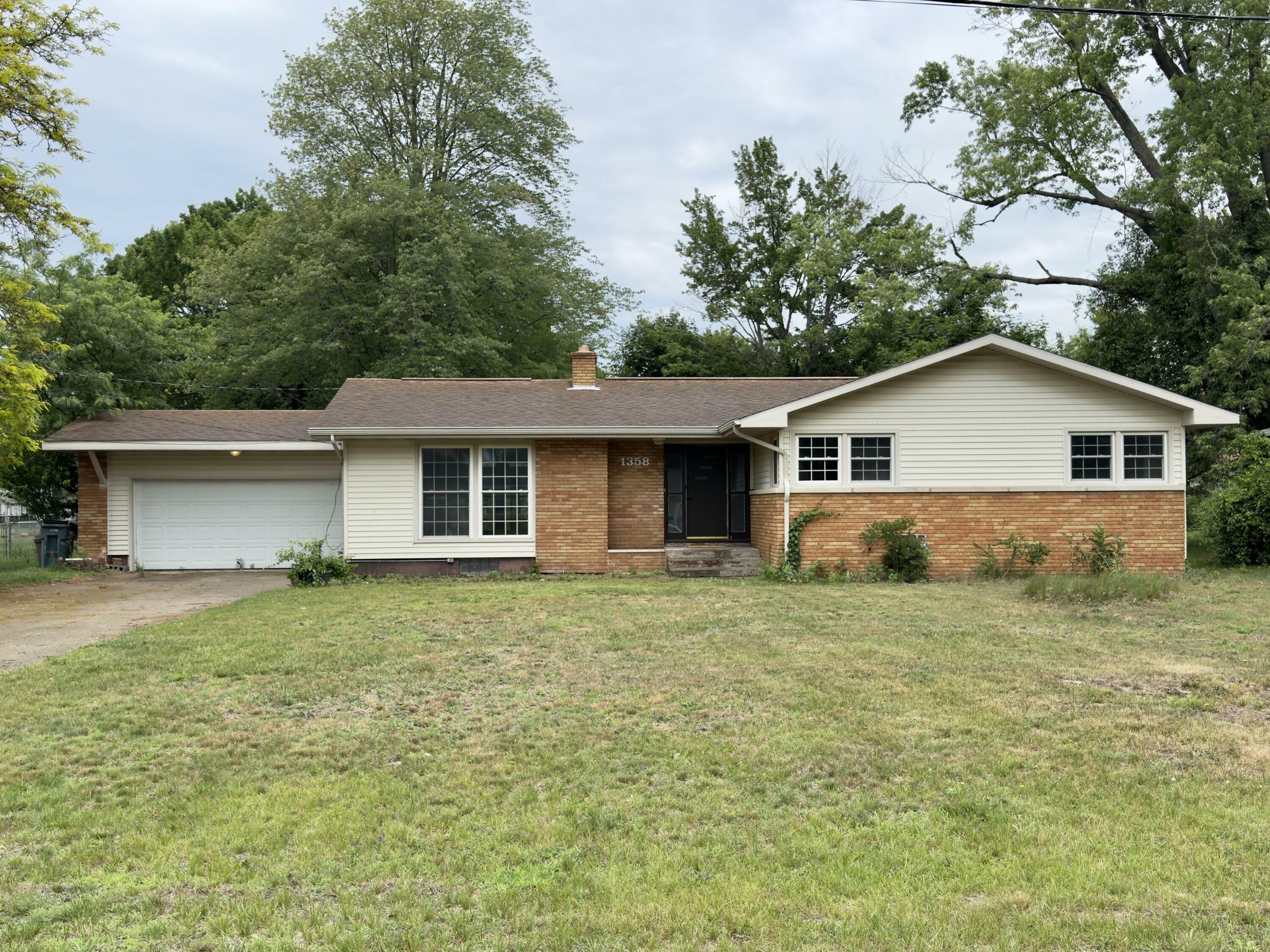 Property Photo:  1358 Neece Drive  MI 49441 