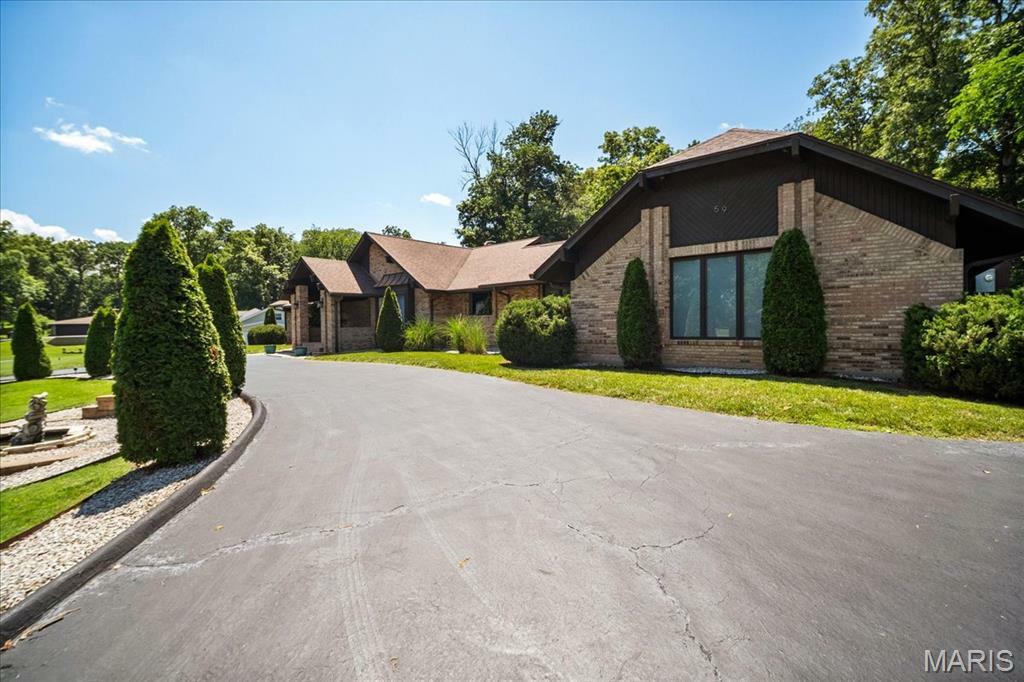 Property Photo: 59 Meadowbrook Country Club Estates Drive Estate MO 63011