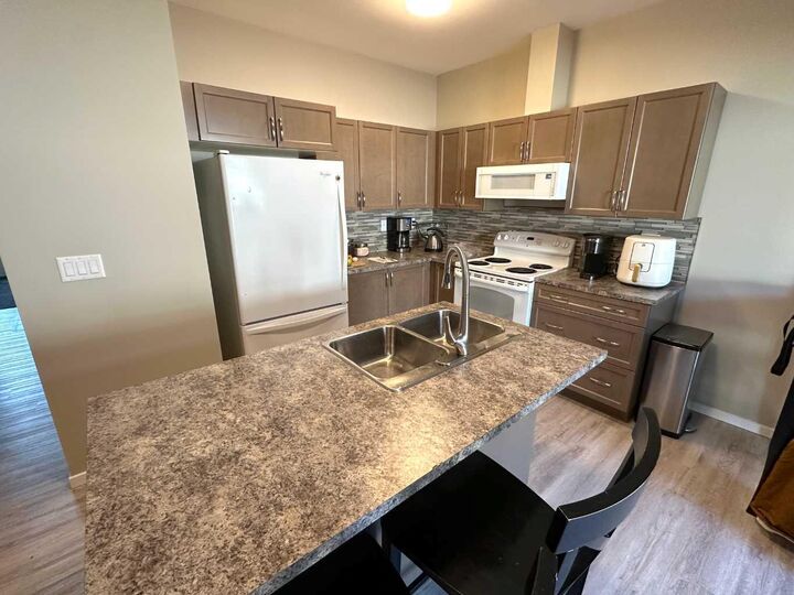 Property Photo:  1004 Minto Street  AB T0M 1R0 
