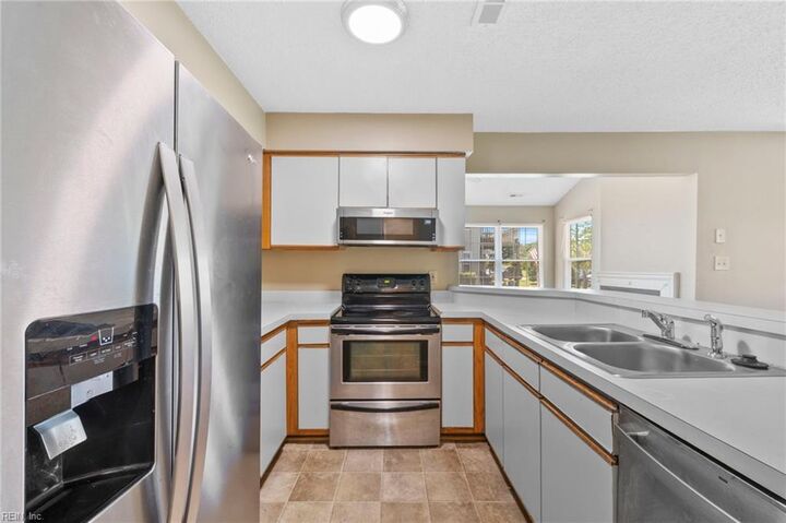 Property Photo: 5012 Thatcher Way VA 23456