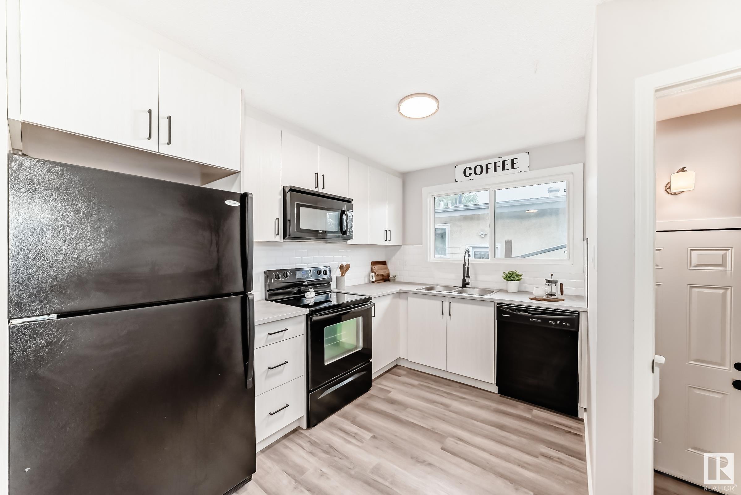 Property Photo:  8405 134 Avenue NW  AB T5E 1G4 