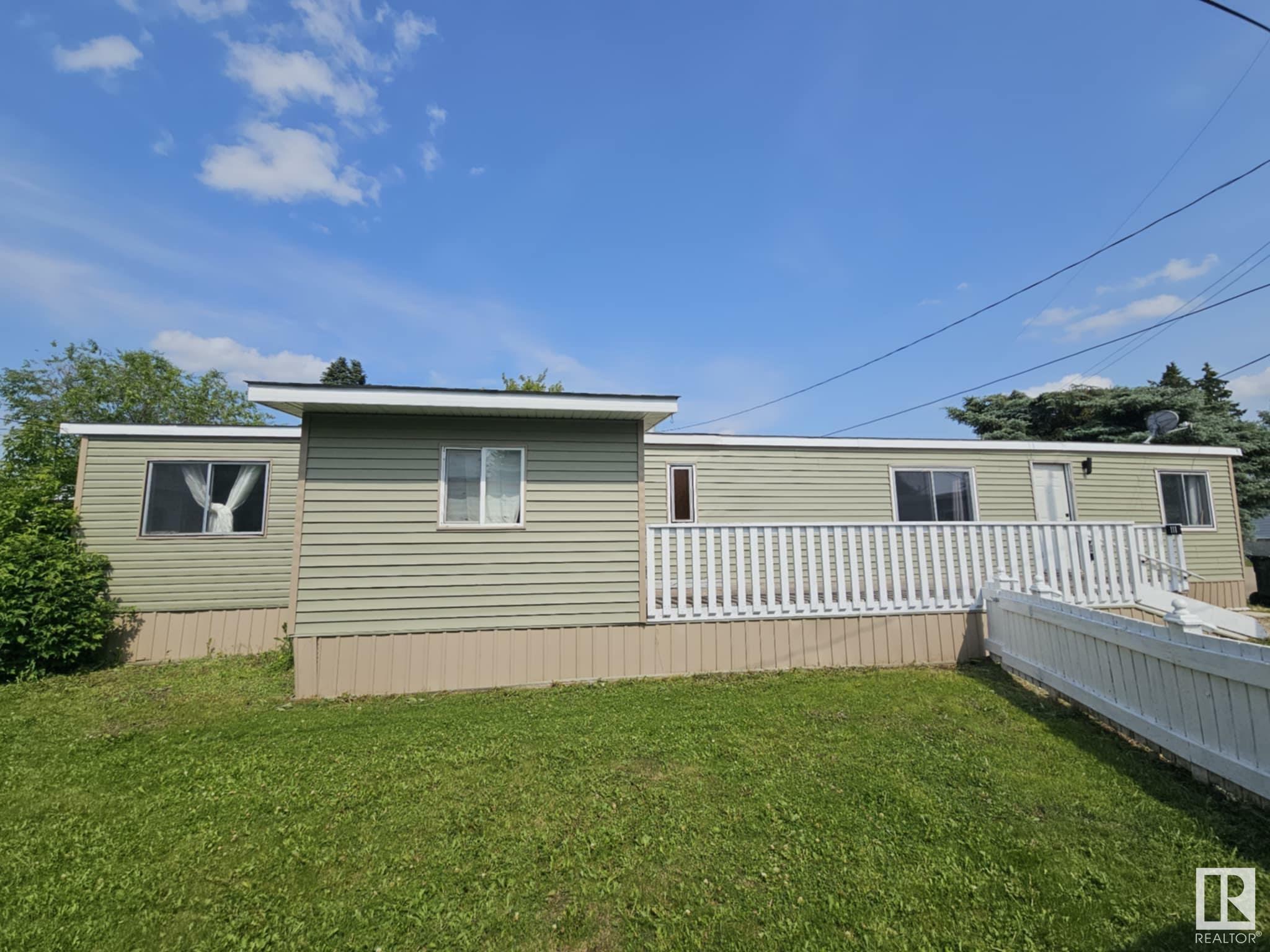 Property Photo: #111 305 Calahoo Rd AB T7X 3K7