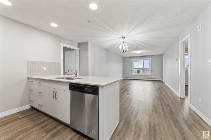 Property Photo: 1506 Tamarack Boulevard NW 310 AB T6T 2J5