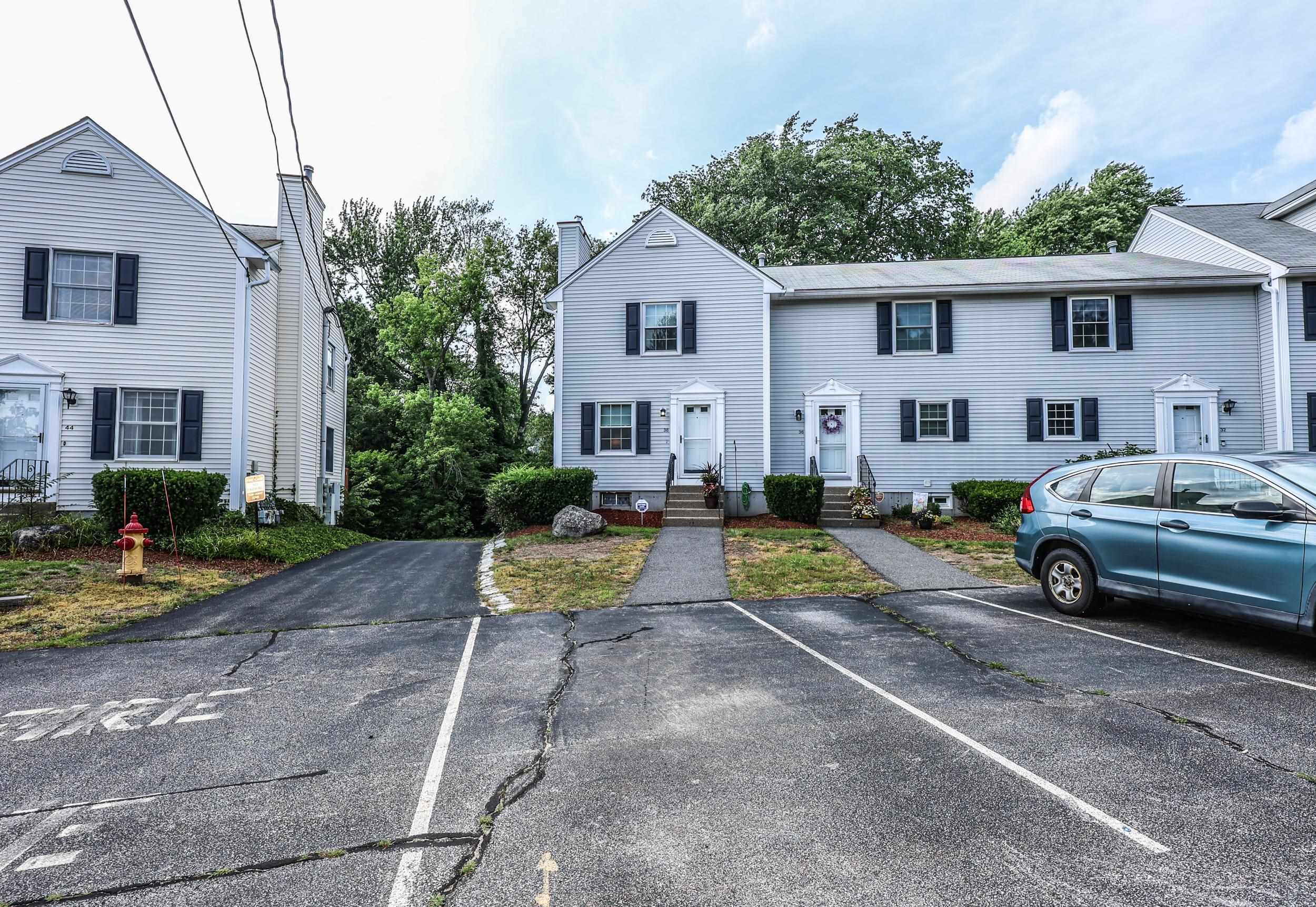 Property Photo: 38 Brook Hollow Way NH 03103