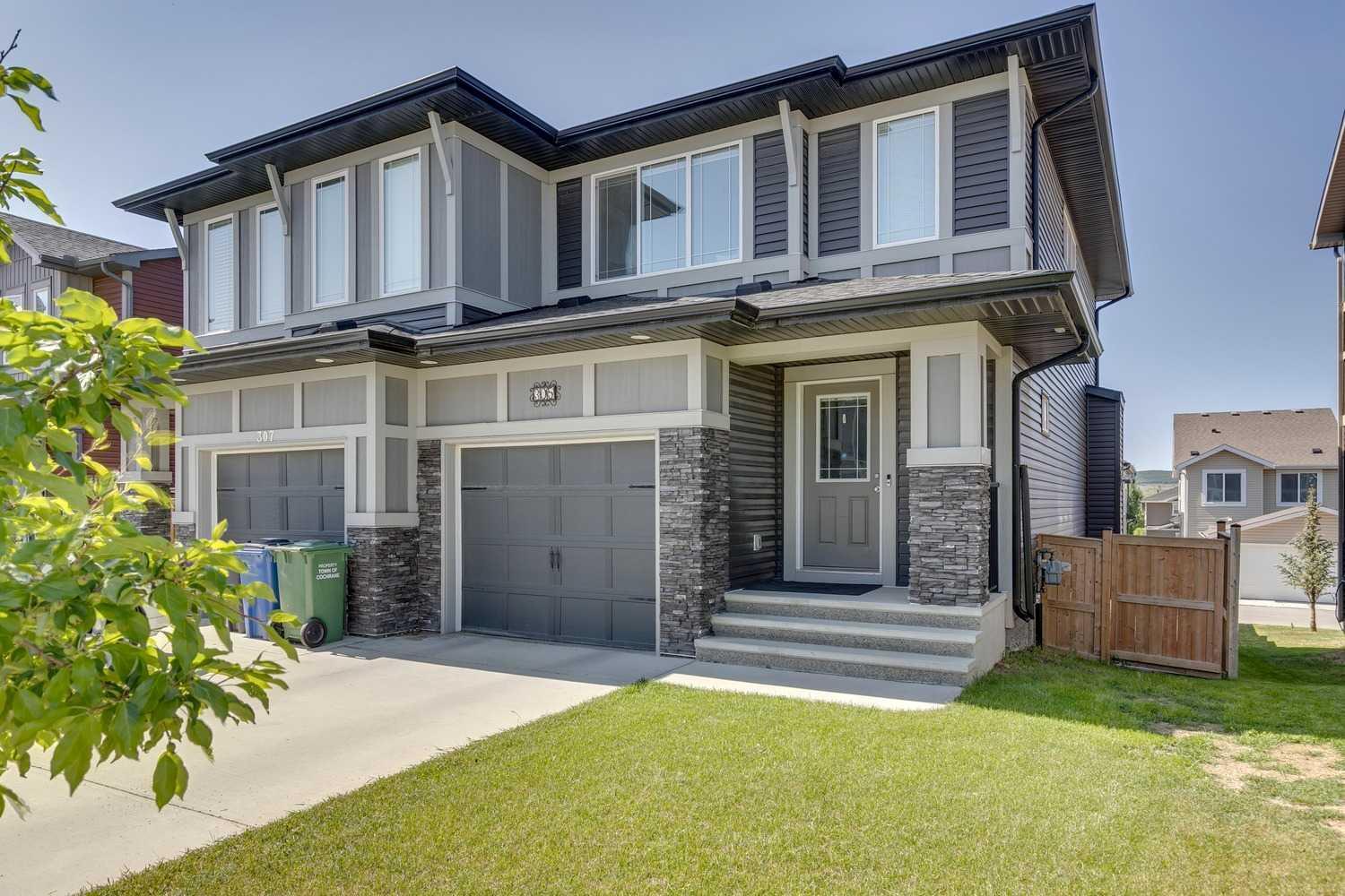 Photo de la propriété: 305 Heartland Crescent AB T4C 2P7