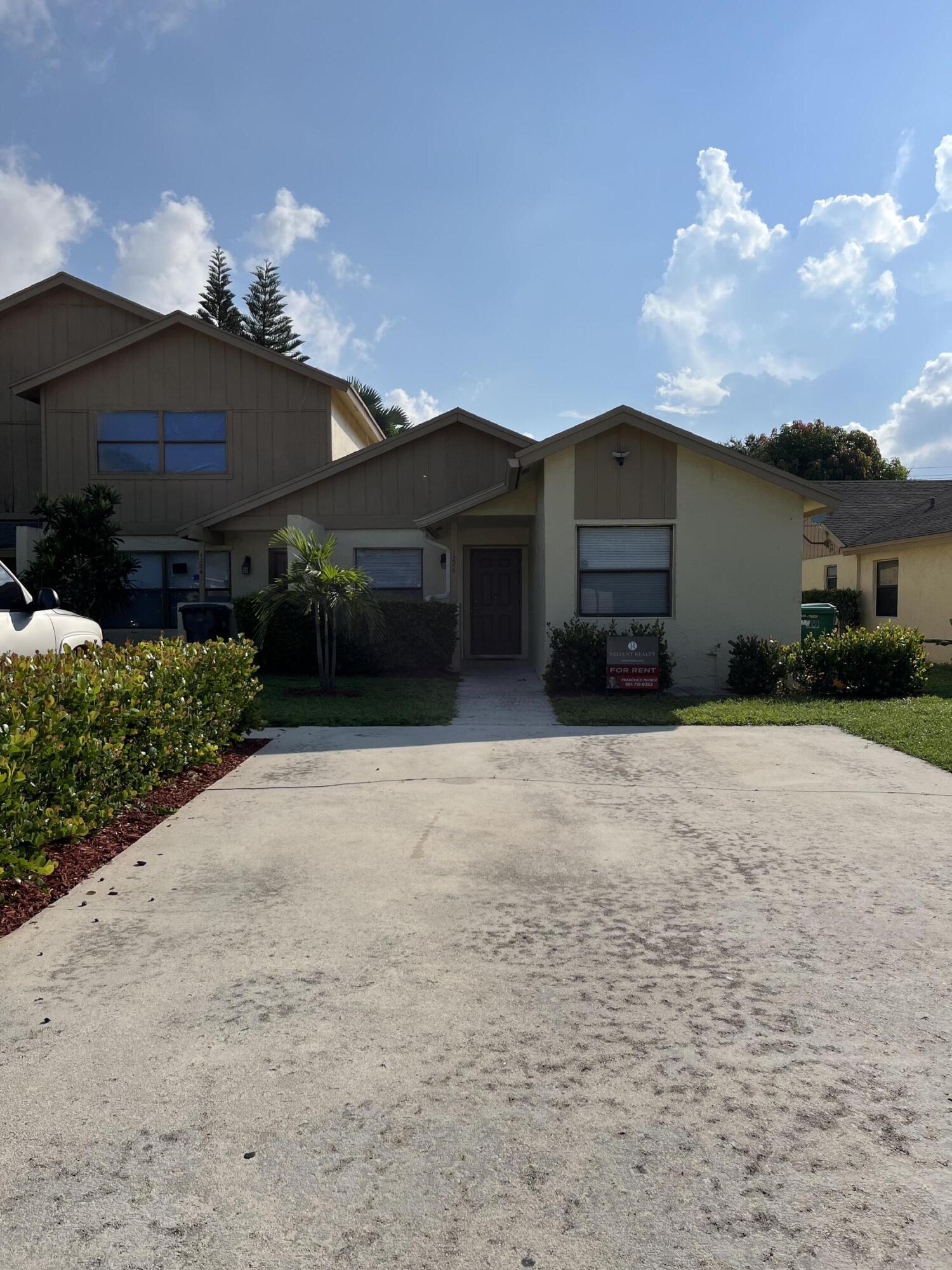 Property Photo: 1296 White Pine Drive FL 33414
