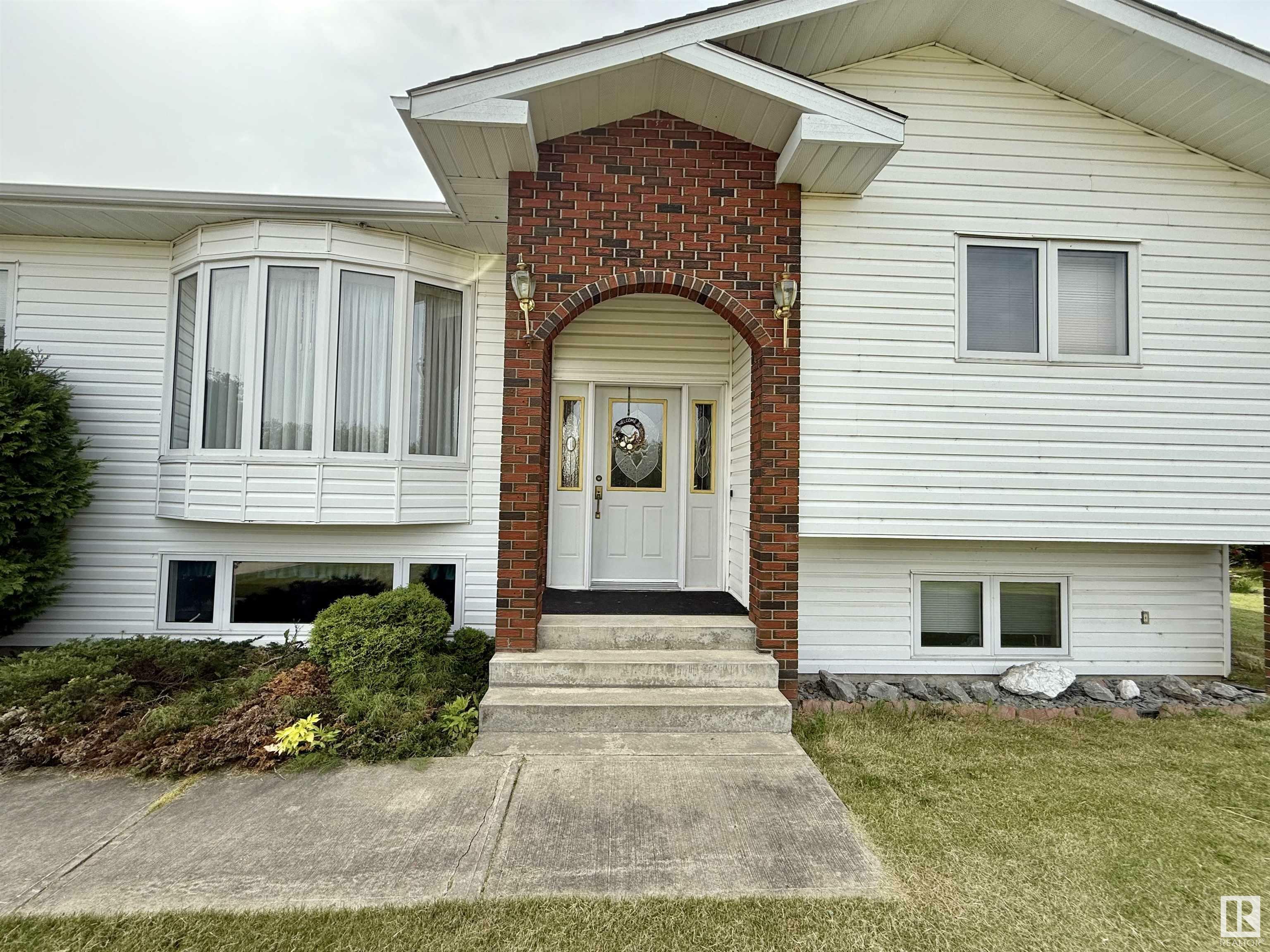 Property Photo: 3711 Railway Avenue AB T0A 2K0
