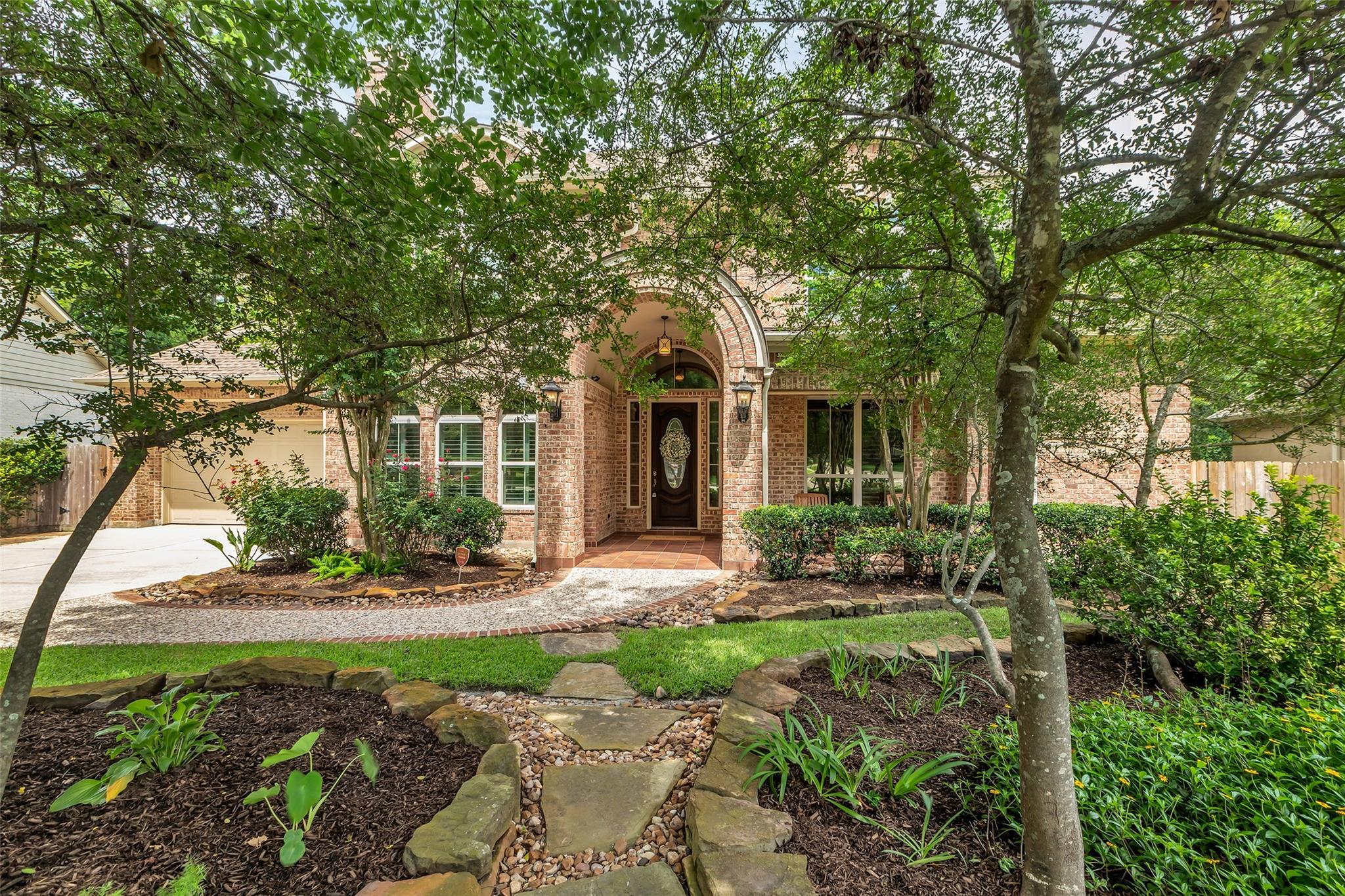 Property Photo:  130 Amulet Oaks Court  TX 77382 