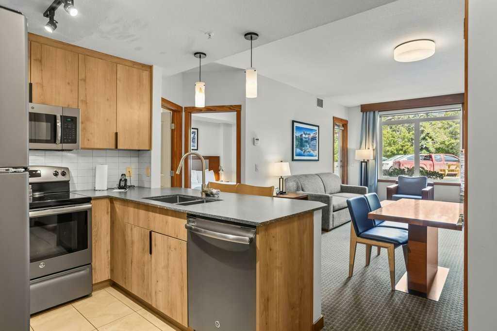 Property Photo: 190 Kananaskis Way 109 AB T1W 3K5