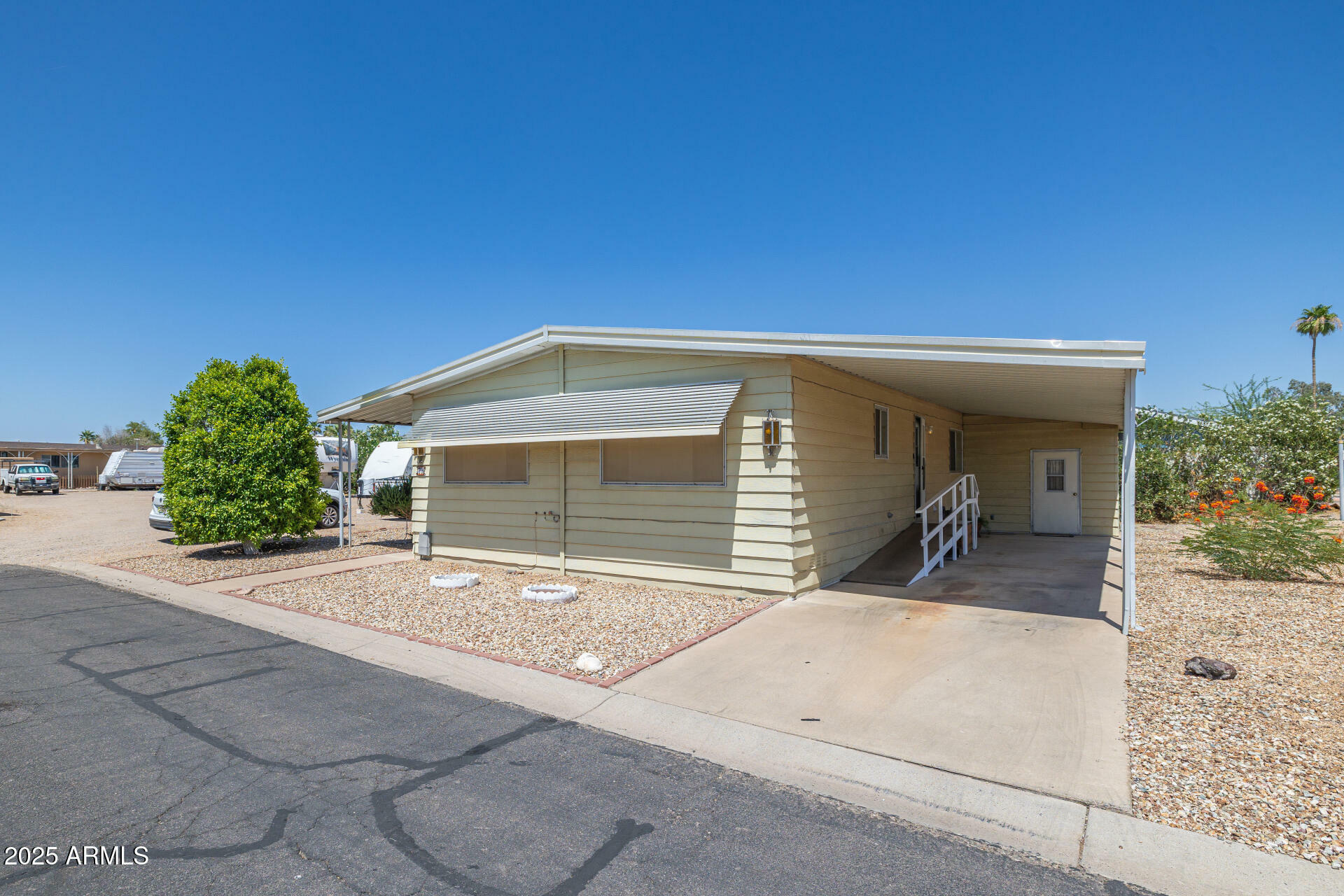 Property Photo: 6960 W Peoria Avenue 74 AZ 85345