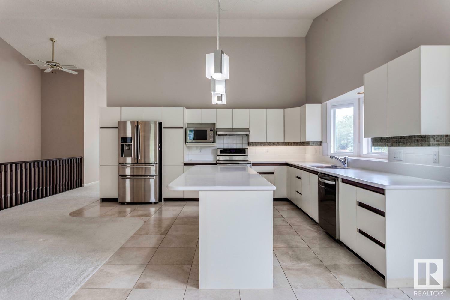 Property Photo: 12416 29A Avenue NW AB T6J 6C6