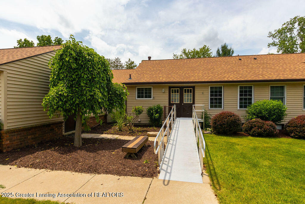 Property Photo:  541 Red Cedar Boulevard  MI 48895 
