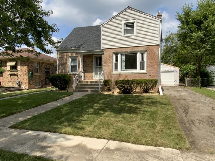 Property Photo: 228 E 141st Street IL 60419