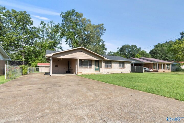 Property Photo:  322 Sharon Street  AL 35768 