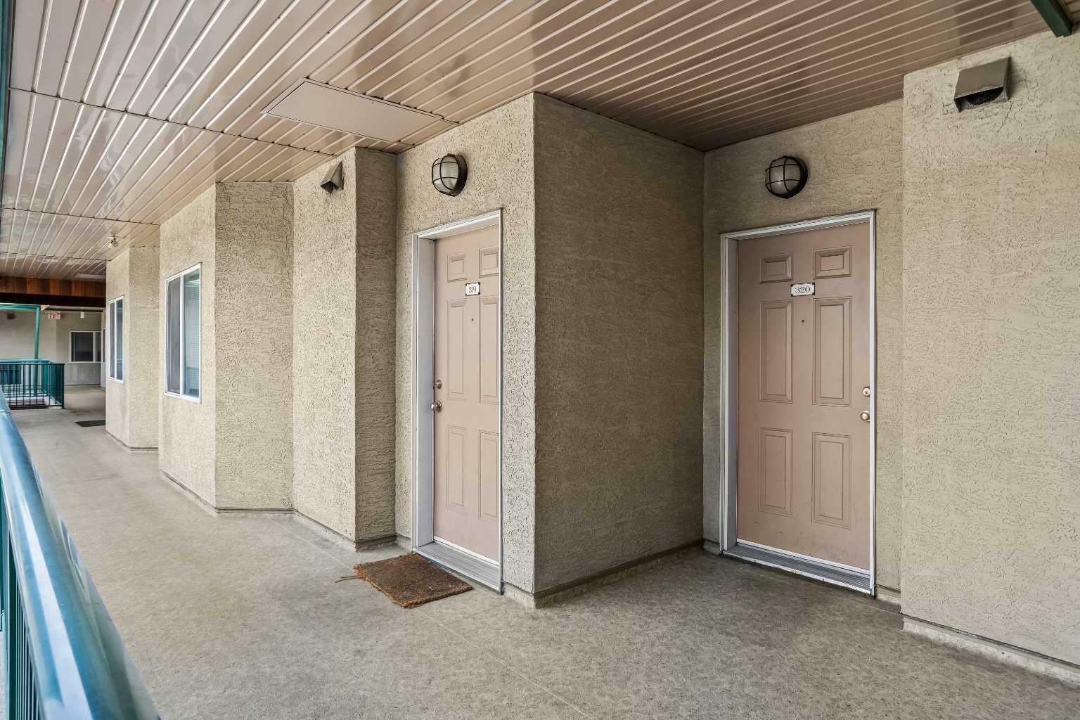Property Photo:  176 Kananaskis 320  AB T1W 3E4 