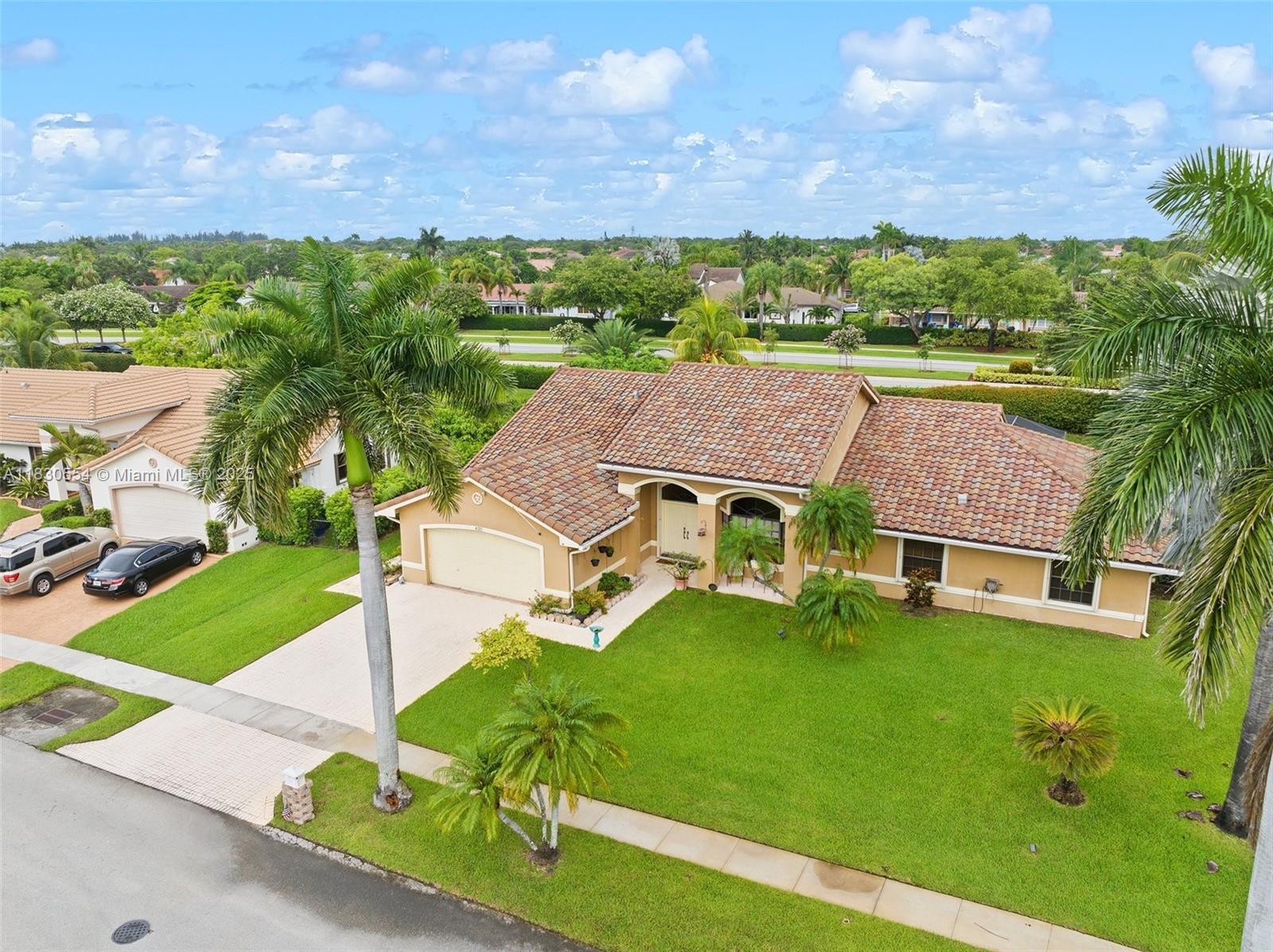 Property Photo:  450 NW 195th Ave  FL 33029 
