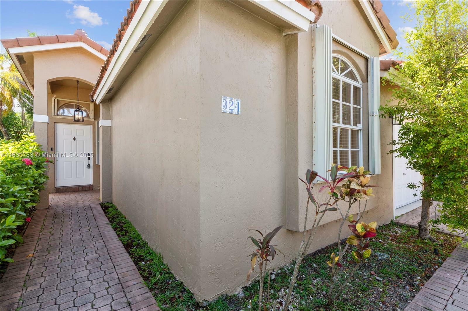 Property Photo: 324 NW 107th Ave FL 33026