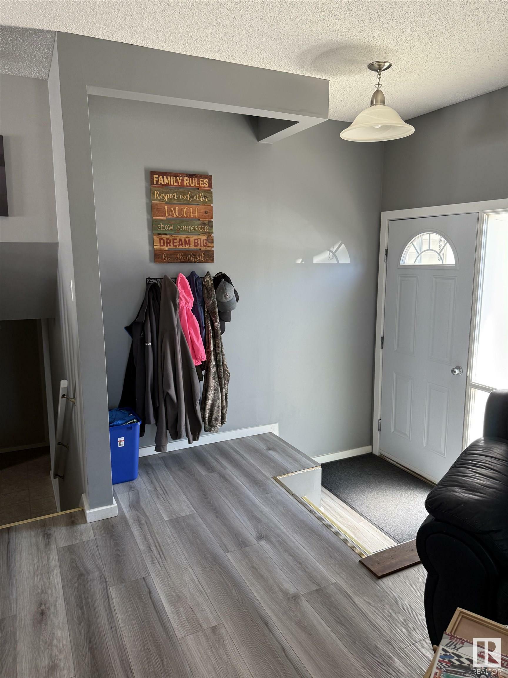 Property Photo: 5813 49 Street AB T9C 1H1