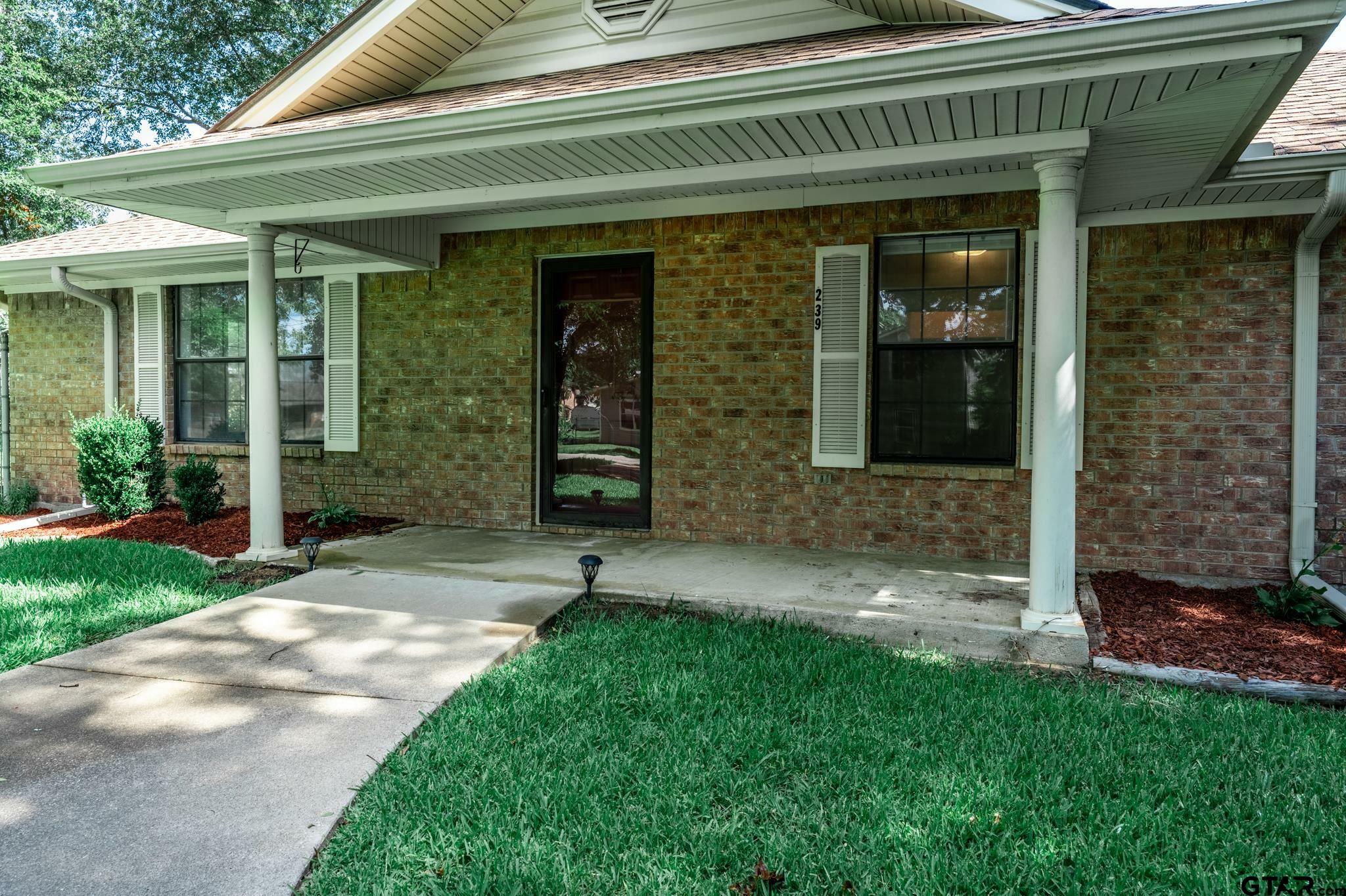Property Photo: 239 E College St TX 75410
