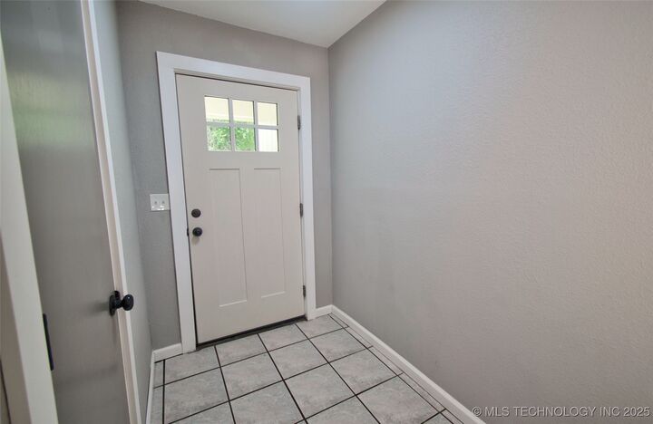 Property Photo:  1619 Quail Run  OK 74403 