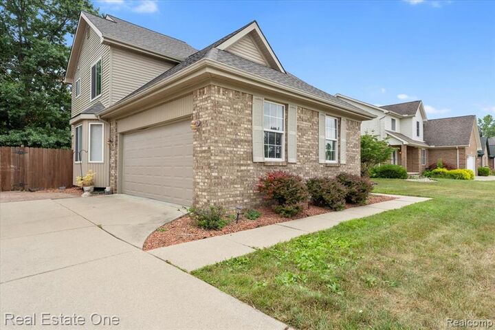 Property Photo: 30026 Huron Meadows Drive MI 48173 8620