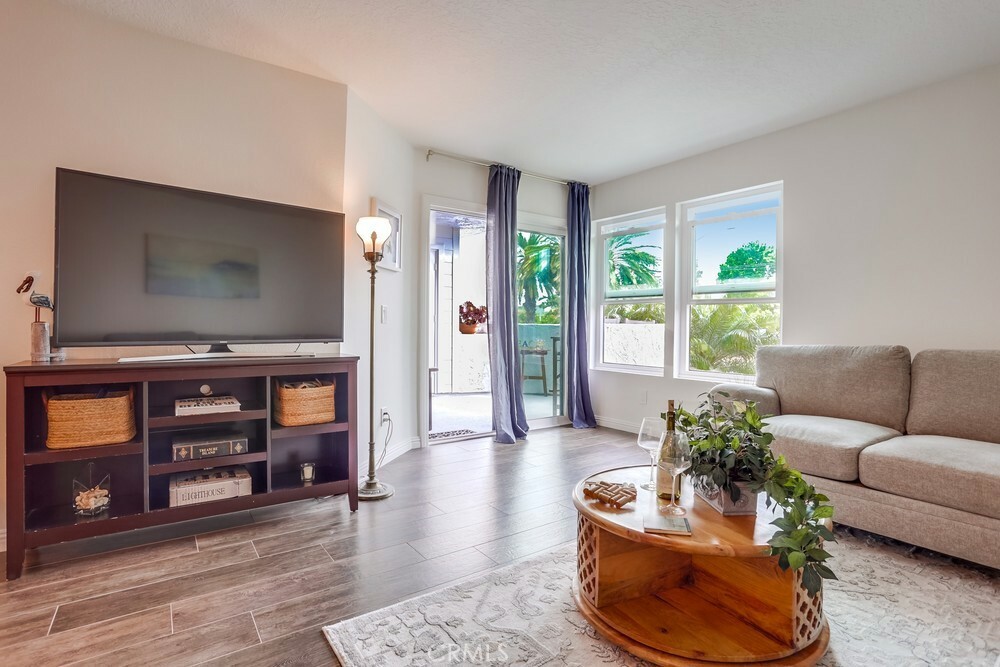 Property Photo: 240 Nice Lane 114 CA 92663